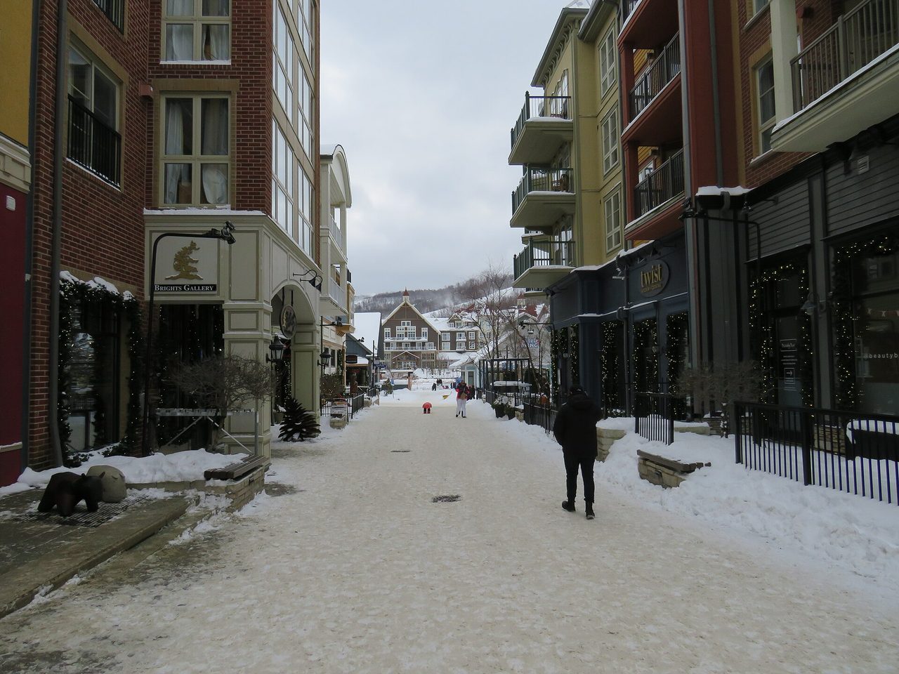 The pedestrian retail street at Blue Mountain Village lined with shopfronts