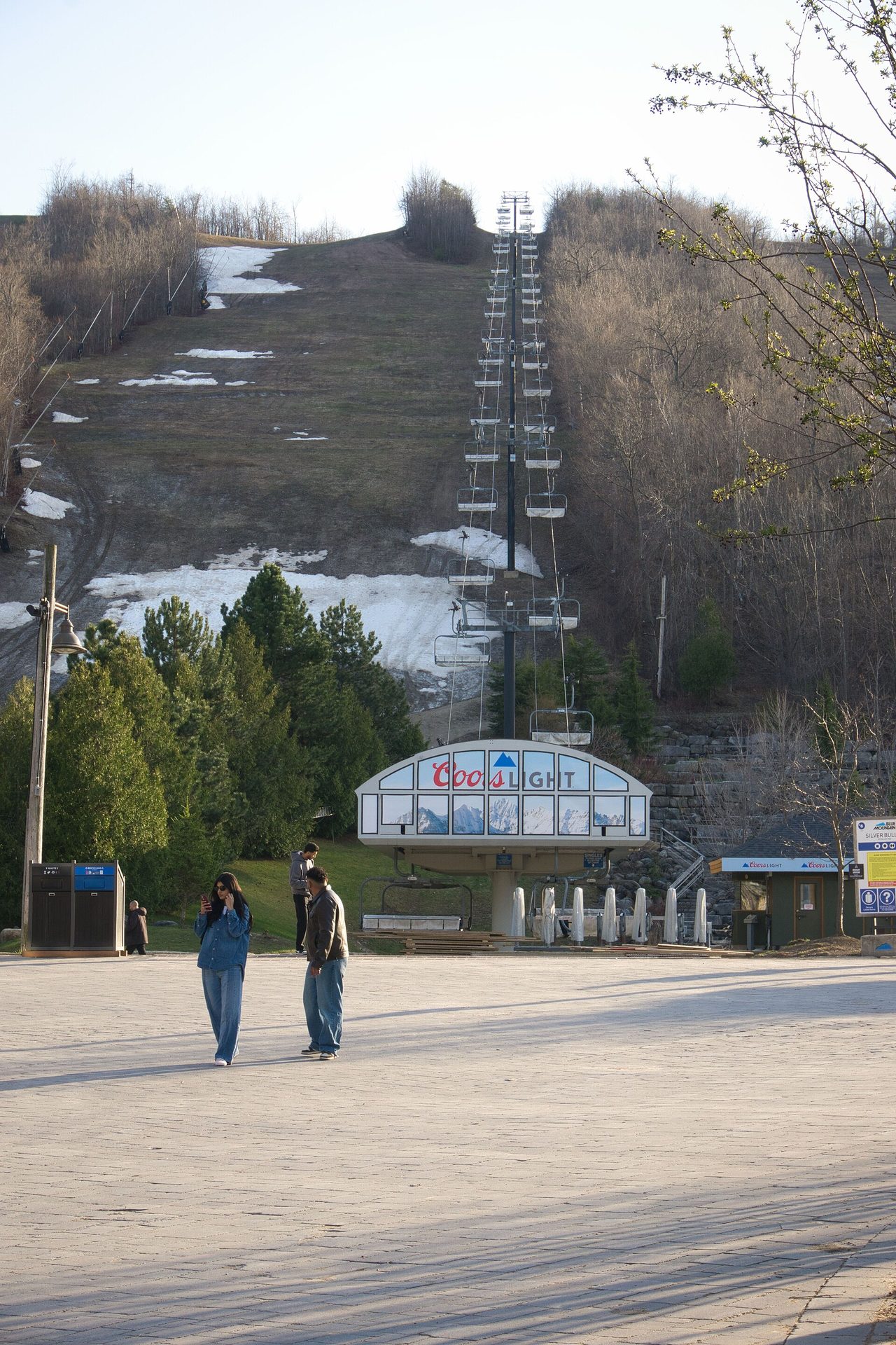 Chairlift towers and cables rising up a ski slope at Blue Mountain